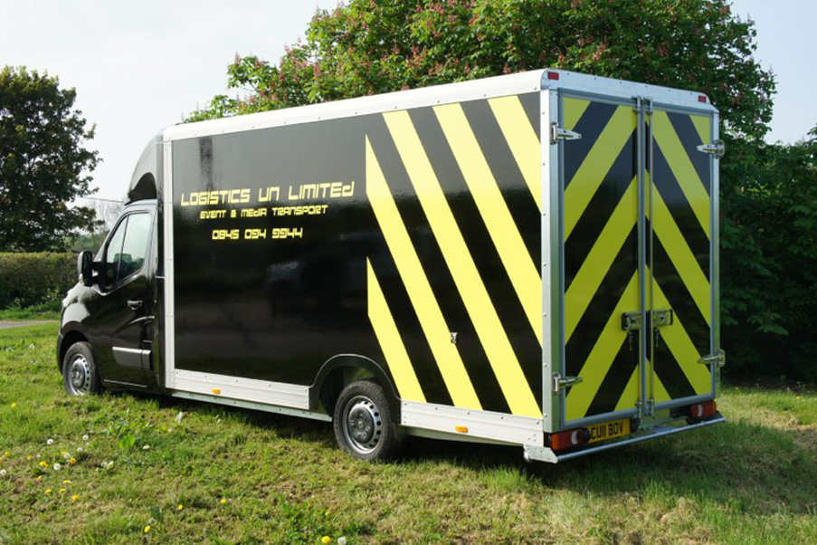 van in a field